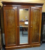 VICTORIAN MAHOGANY TRIPLE WARDROBE, arched panel doors and replaced mirror centre, 178cms wide x