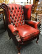 VINTAGE BUTTONED RED LEATHER WING-BACK ARM CHAIR Condition Report: arms and back worn leather.