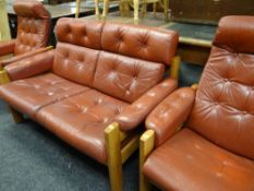 EKORNES NORWEGIAN TEAK FRAMED RECLINING RED LEATHER SOFA SUITE one two-seater and two single (3)