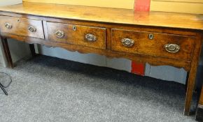 18TH CENTURY ELM OAK DRESSER BASE, three deep frieze drawers and carved apron, square section