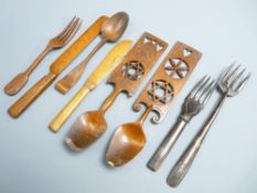 LOVE SPOONS & CUTLERY carved in sycamore and other woods, the love spoons dated 1901 and 1904