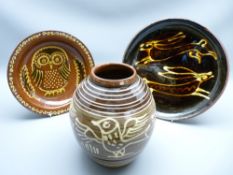SLIPWARE DECORATED POTTERY x 3 including a globular vase, 24.5cms high decorated with birds, an
