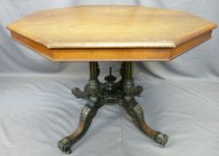 OCTAGONAL TOP VICTORIAN TABLE on fancy gilt highlighted four-column four-footed ebonized and