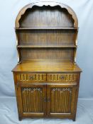 PRIORY-STYLE OAK DUTCH TOP DRESSER, 177cms high x 95cms wide x 44cms deep with linen fold carved