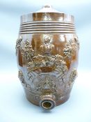 SALT GLAZED STONEWARE BARREL having recumbent lions and other detail in relief, 40cms high