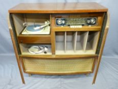 VINTAGE BUSH RADIOGRAM & RECORD DECK in two-door walnut cabinet, having record and other storage