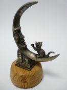 VINTAGE CAR MASCOT-CLAIR de LUNE/MOONLIGHT cat on moon, seated, after E T Mercier, French, bears