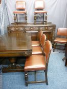 CARVED OAK VINTAGE DINING SUITE consisting of railback sideboard, 103cms overall height x 183cms