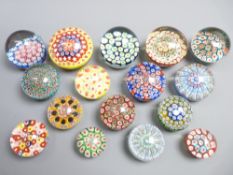 MILLEFIORI PAPERWEIGHTS x 16, 9cms diam. the largest
