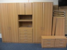 LUXOR MODULAR LIGHTWOOD BEDROOM SYSTEM with matching bed frame, 220cms H, 275cms W, 60cms D, the