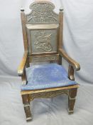 OAK EISTEDDFOD CHAIR with carved detail including a central dragon panel below the words 'Eisteddfod