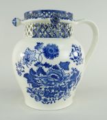 SWANSEA CAMBRIAN PEARLWARE POTTERY BLUE & WHITE PUZZLE JUG decorated with Chinese-style peonies