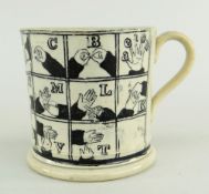 INTRIGUING 19TH CENTURY POTTERY SIGN LANGUAGE MUG primitively decorated in monochrome with a sign
