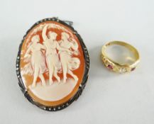 18CT YELLOW GOLD GYPSY RING set with centre diamond flanked by two red stones, 2.6gms, together with