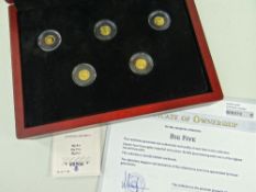 CASED SET OF FIVE GOLD COINS 'BIG 5' to commemorate African wildlife, believed 999/1000 gold, 0.5gms