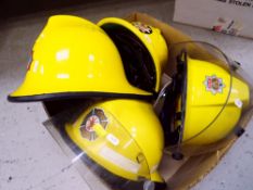FOUR VARIOUS FIRE BRIGADE HELMETS including Yorkshire, West Midlands and London (4)
