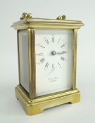 FRENCH BRASS CARRIAGE CLOCK bearing Roman numerals, inscribed 'Bernard Freres, Montbeliard', 11cms