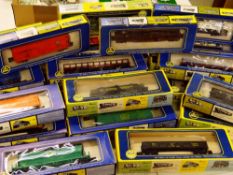 COLLECTION OF A H M OO GAUGE RAILWAY CARRIAGES & FREIGHT CARS
