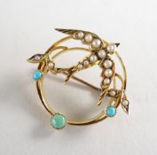 YELLOW GOLD SEED PEARL & TURQUOISE SWALLOW BROOCH in a circular frame, un-hallmarked, 3.8gms