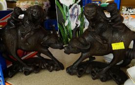 PAIR OF ORIENTAL INLAID HARDWOOD BUFFALO MODELS WITH RIDERS (2)