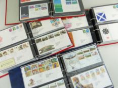 FOUR ALBUMS OF FIRST DAY COVERS (3 x red, 1 x blue)