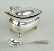 GEORGE III SILVER MUSTARD POT of oval form on corner ball feet and with gadrooned border and shell