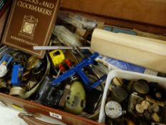 COLLECTION OF WATCH MAKERS WORKSHOP ITEMS contained within a suitcase and two boxes, including watch
