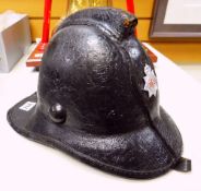 VINTAGE LEATHER BRITISH FIRE BRIGADE HELMET bearing white metal NFS badge and leather chin strap