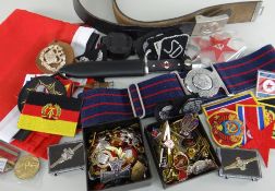 COLLECTION OF REPLICA MILITARIA including badges, belts ETC