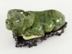 REPUBLICAN CHINESE GREEN MINERAL MODEL OF A RECLINING BUFFALO boxed and with hardwood stand, buffalo