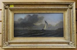 CIRCLE OF JAMES HARRIS oil on panel - sailboats and larger vessel off headland with lighthouse,