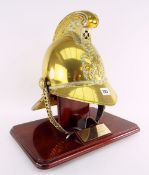 ANTIQUE BRASS MERRYWEATHER-TYPE FIRE BRIGADE HELMET on stand with plaque