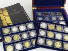THE MILLIONAIRES COLLECTION COINAGE SET displayed on three trays in a mahogany box and being set
