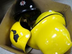 FOUR VARIOUS FIRE BRIGADE HELMETS including Strathclyde, Leeds-Bradford Airport and Fleet Air Arm (