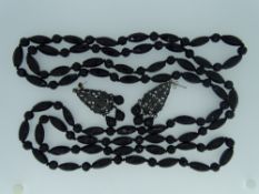 LONG BLACK JET NECKLACE and pair of non-matching similar drop earrings