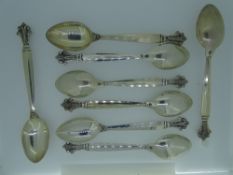SILVER TEASPOONS, a set of six marked '925' and all with handsome scrolled ends, 4.9ozs