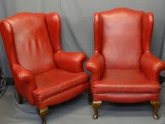 VINTAGE WINGBACK ARMCHAIRS, a pair, in red leather effect