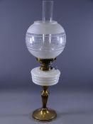 OIL LAMP, circular base brass with tapered column, milk glass reservoir and etched bowl shade