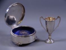 SILVER RING BOX, circular, Birmingham 1942 (some dents overall) and a miniature silver twin-