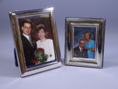 SILVER EASEL PHOTO FRAMES, a pair, each of plain form to take images 12.5 x 8.5cms, Sheffield 1996