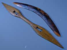 TRIBAL WEAPONS to include a double ended short spear, 63.5cms long and a decorative boomerang, 48cms