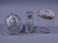 THREE SILVER TOPPED CONTAINERS including oval dressing table jar with silver top, 0.8 ozs,