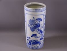 20TH CENTURY BLUE & WHITE POTTERY UMBRELLA STAND with floral and cloud decoration, 38cms H