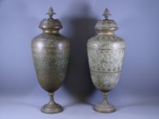 EASTERN BRASS URNS & COVERS, a pair, with cone finial caps decorated with birds, animal and people