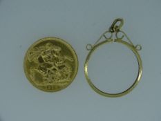 1912 GOLD SOVEREIGN with an unattached nine carat gold mount, 1.8grms