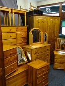 EXTENSIVE SUITE OF PINE BEDROOM FURNITURE, thirteen pieces including double door wardrobe, various