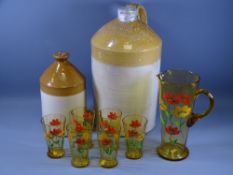 STONEWARE FLAGONS X 2 and a painted amber glass lemonade set