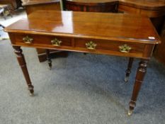 VICTORIAN MAHOGANY SIDE TABLE fitted two frieze drawers on turned legs, brass castors, 97 x 52cms