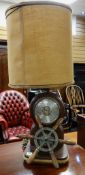 UNUSUAL NAUTICAL TABLE LIGHT the base incorporating miniature ship's wheel and Carrington aneroid