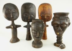 TWO KUBA PALM WINE CUPS carved with faces, tallest 25.5cms; and three souvenir Ashanti dolls,